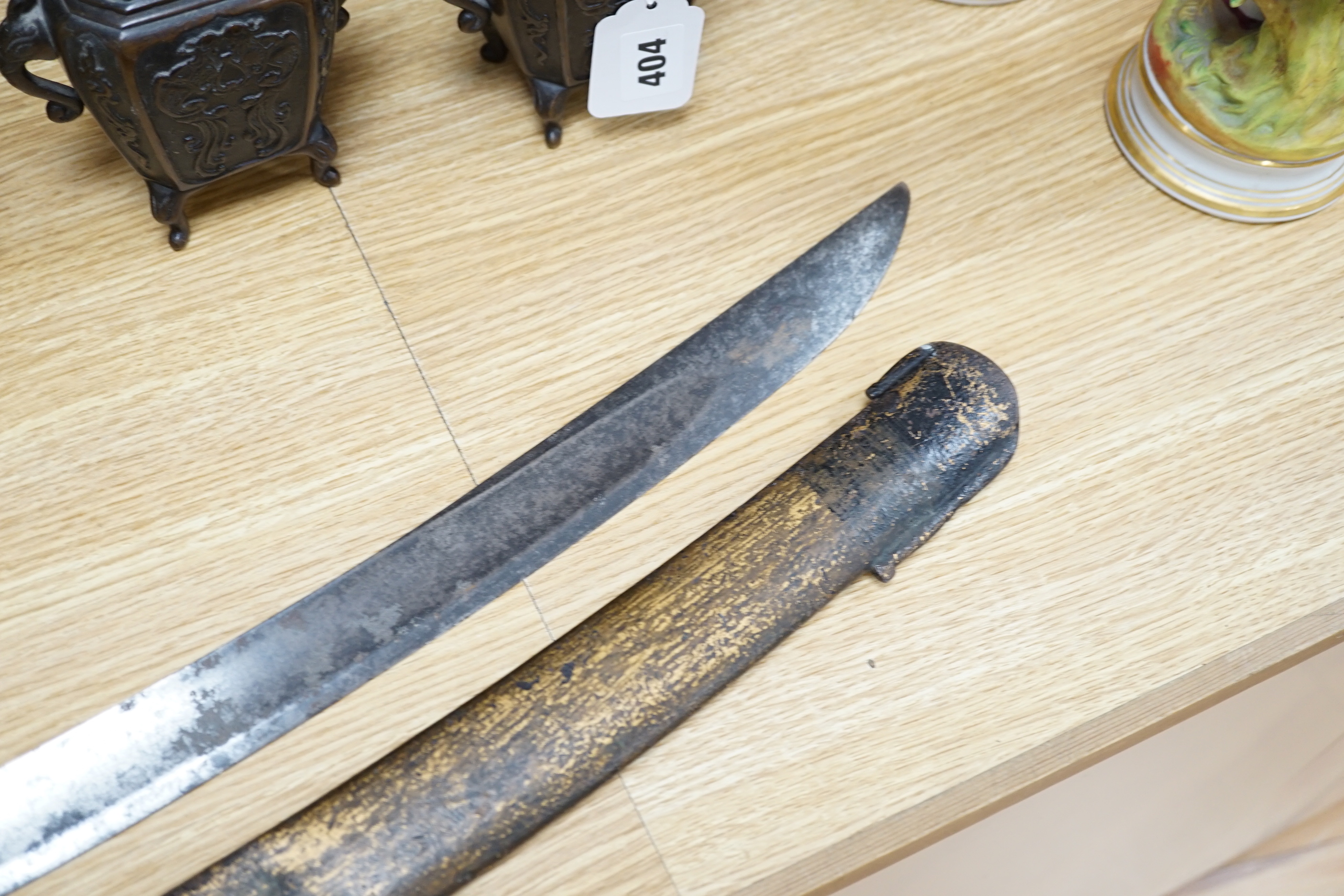 An 18th century English cavalry sword with eastern related engraving to blade